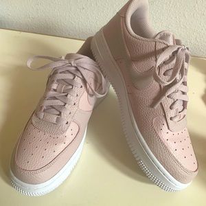 Pink Nike Air Force 1’s. Low